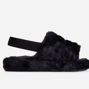 Black fuzzy slippers